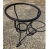 Round table in lava stone and wrought iron